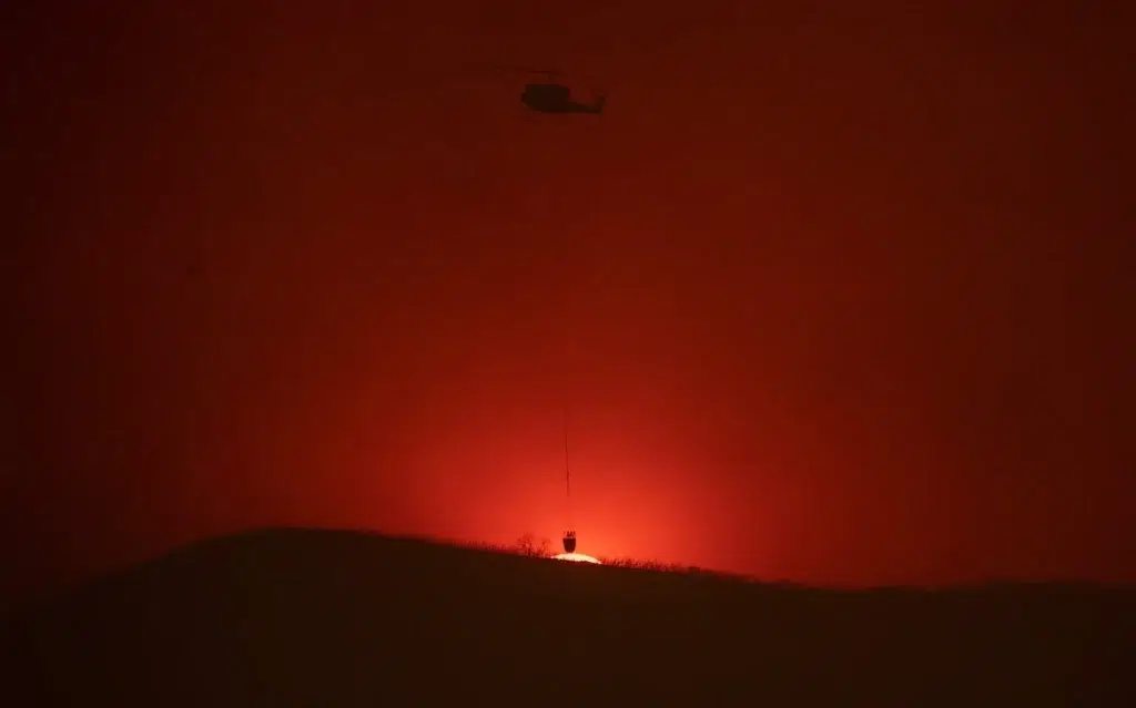 Helicopter, Helicopter rotor, documentary photography by Josh Edelson/AFP