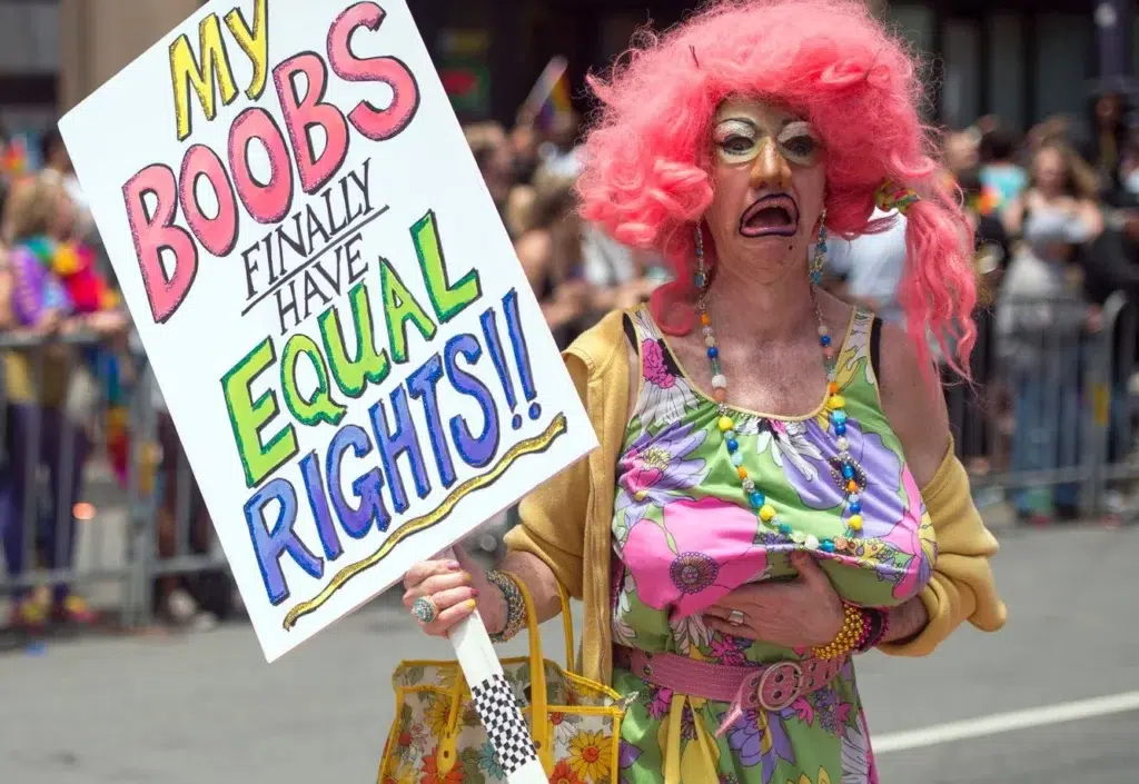 Pride (LGBTQ culture), light-hearted, Costume party, documentary photography by Josh Edelson/AFP