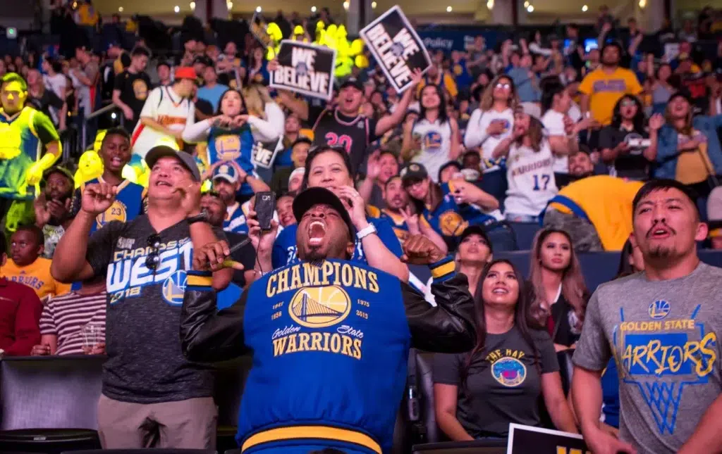 Golden State fans celebrate NBA championship win, photo by Josh Edelson/AFP