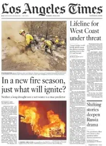 the Los Angeles Times — firefighters confronting a California wildfire  — a Josh Edelson photograph
