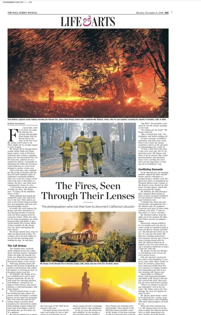 A California wildfire photographed by Josh Edelson (embers filling the sky over a wildfire)