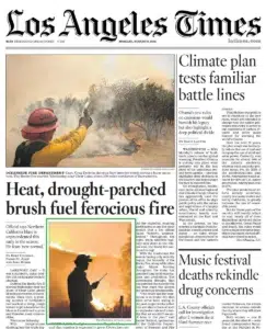 the Los Angeles Times — a wall of wildfire flames in a photograph by Josh Edelson