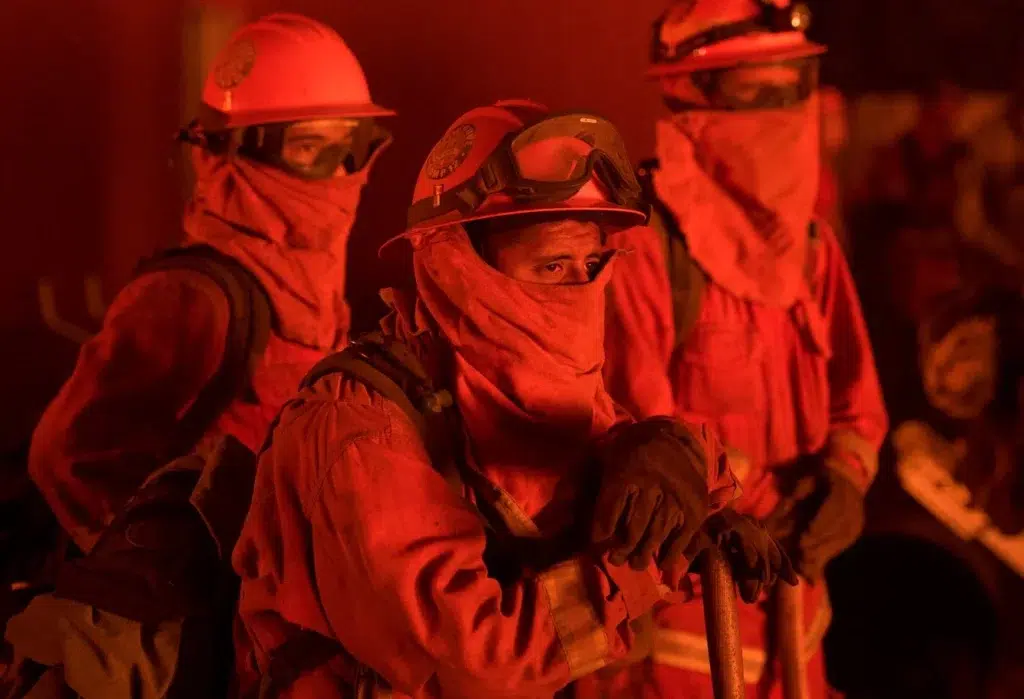 California wildfires scorch parched hillsides and destroy one home ..., photo by Josh Edelson/AFP