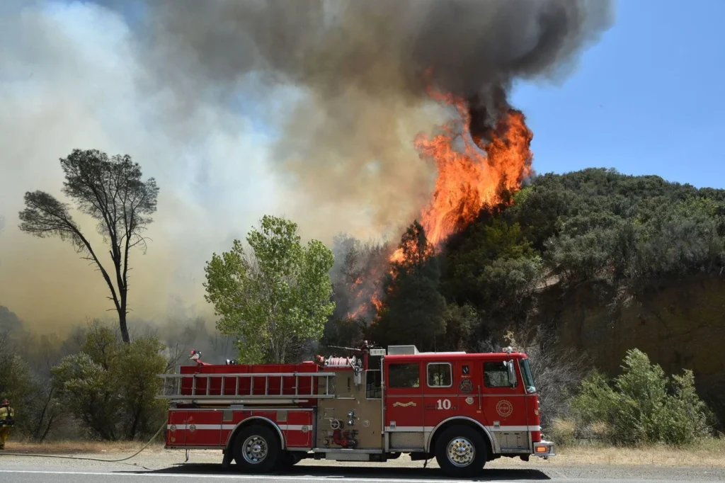 Fire department, Fire engine, Firefighter, documentary photography by Josh Edelson/AFP