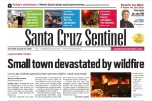the Santa Cruz Sentinel — firefighters confronting a California wildfire, photographed by Josh Edelson