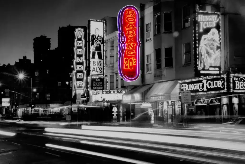 Neon Sign, Zebra crossing, Street light, documentary photography by Josh Edelson/AFP