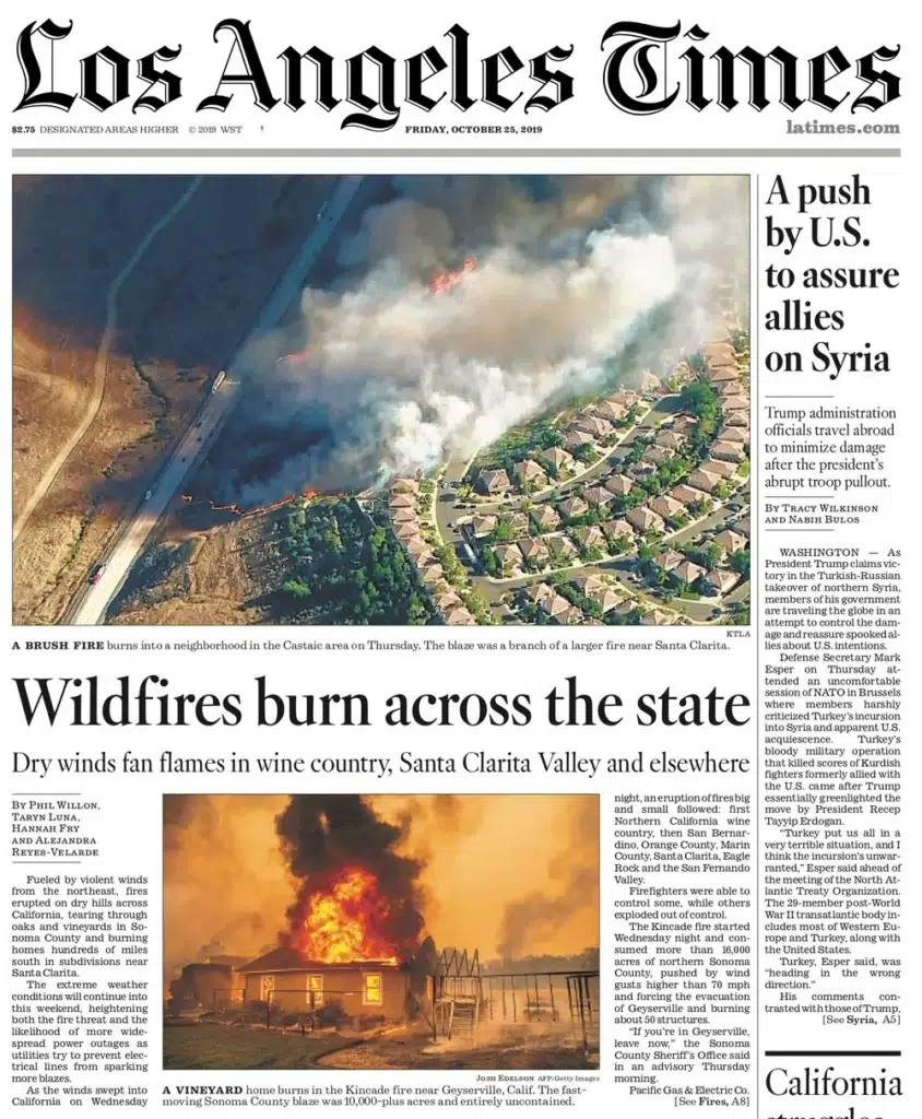 the Los Angeles Times, flames sweeping across a California hillside in a photograph by Josh Edelson