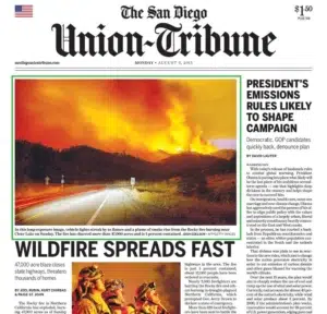 The San Diego Union-Tribune — a wildfire bearing down on a community  — a Josh Edelson photograph