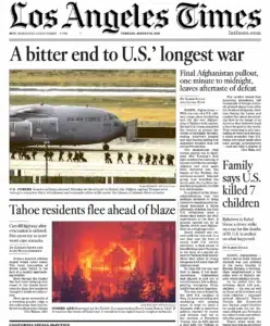 the Los Angeles Times — a wildfire bearing down on a community, captured by Josh Edelson