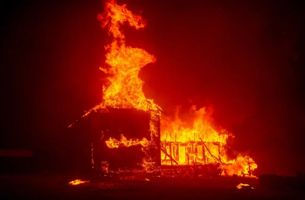 Photographer captures devastation from the front lines of the Camp ..., photo by Josh Edelson/AFP