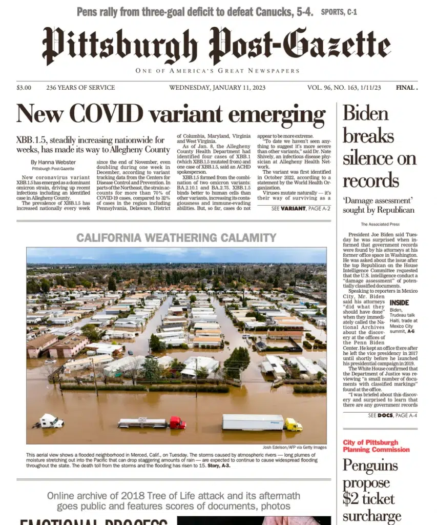the Pittsburgh Post-Gazette, a wind-driven wildfire racing toward homes in a photograph by Josh Edelson