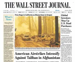 The Wall Street Journal — a wall of wildfire flames  — a Josh Edelson photograph