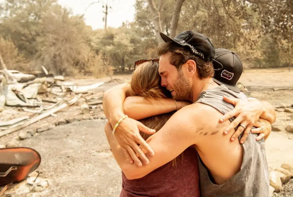 National Hugging Day, Friendship, Pronunciation, documentary photography by Josh Edelson/AFP