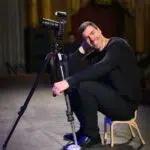 Josh photographing a graduation commencement