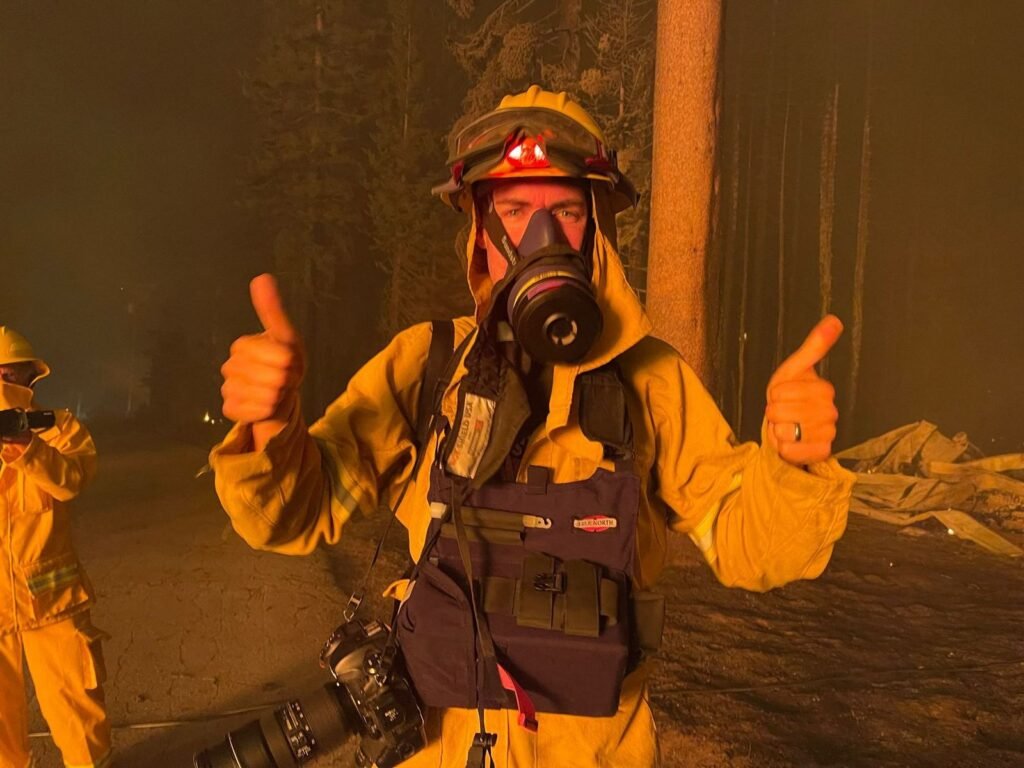 Josh Edelson in firefighting gear on the fire line during a California wildfire