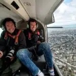 Josh photographing out the side of an airplane