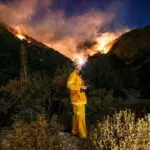 Josh shooting at a fire