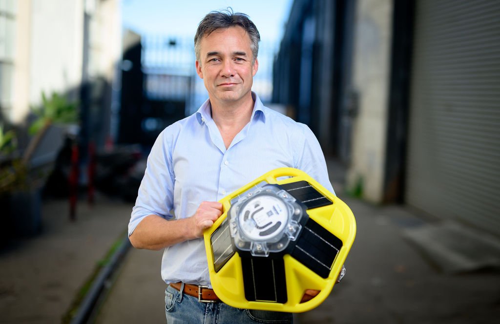 Executive environmental portrait by Josh Edelson at a San Francisco technology company facility.