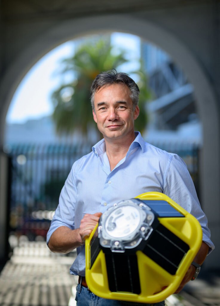 Sofar Ocean Technologies CEO Tim Janssen holding a Spotter Buoy outside the San Francisco facility