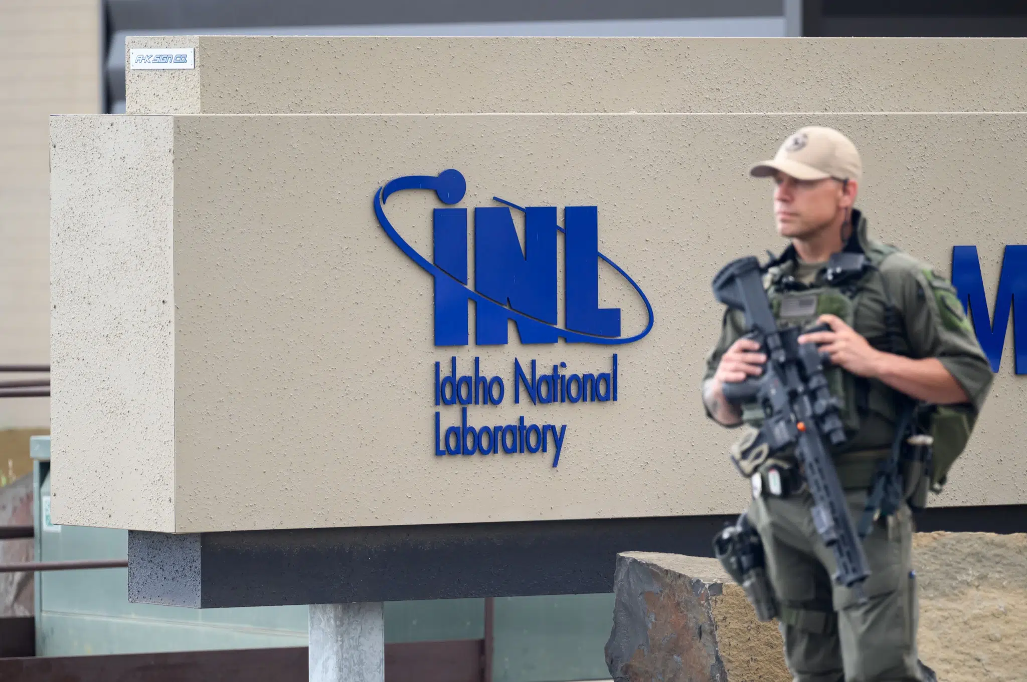 Armed guards look on during the Secretary of Energy tour at Idaho National Laboratory