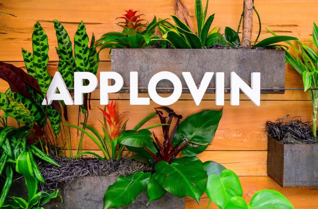 Company branding on a living plant wall at a corporate event venue, by Josh Edelson