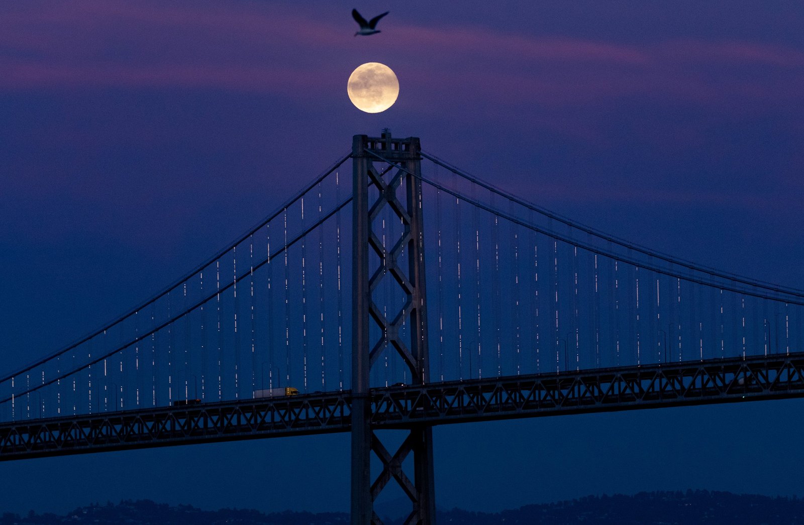 Full Moon San Francisco Bay Bridge Josh Edelson.jpg