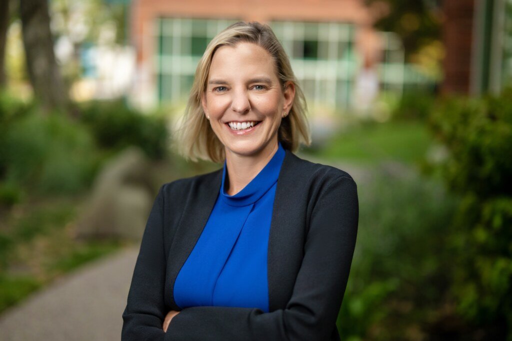 Executive portrait session for 4DMT leadership, photographed outdoors with a single umbrella-softened light. (Photo by Josh Edelson for 4DMT)