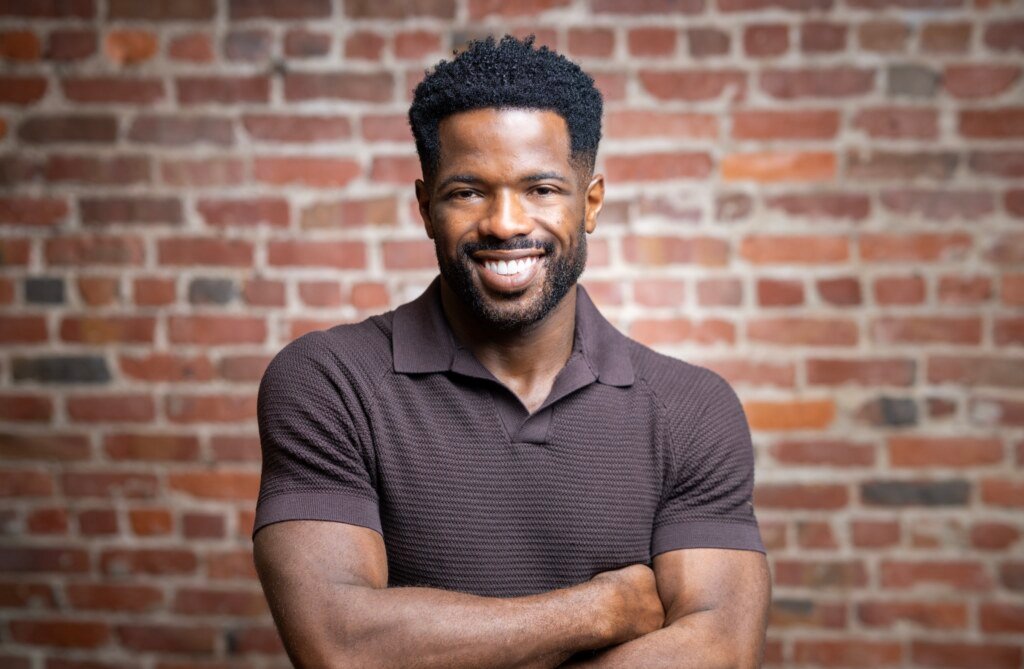 Kevin Caldwell, Ossium Health CEO, studio-lit headshot against a brick wall in San Francisco