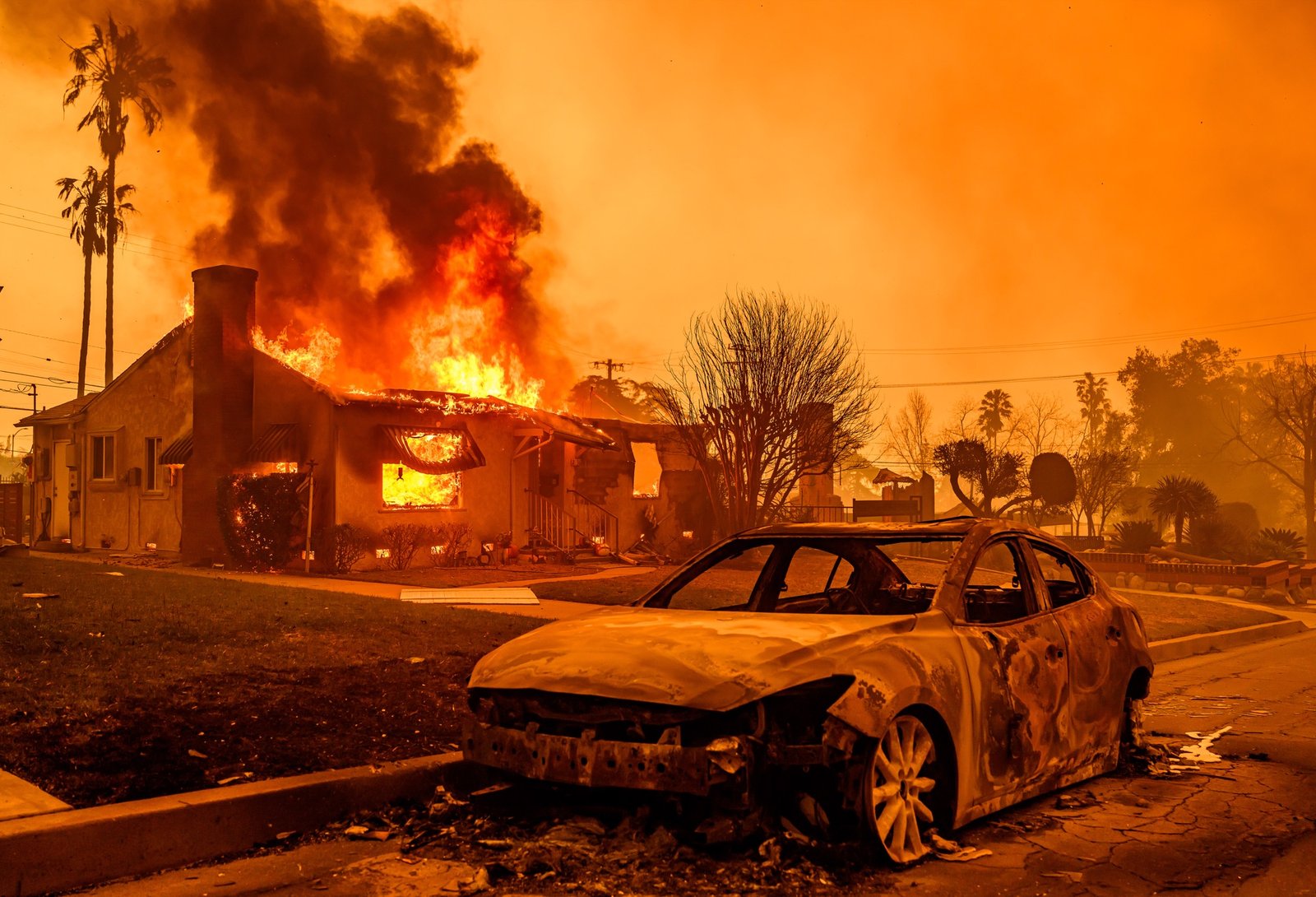 A home burns during the Eaton fire in the Altadena area of Los Angeles county, California on January 08, 2025. (Josh Edelson / AFP)