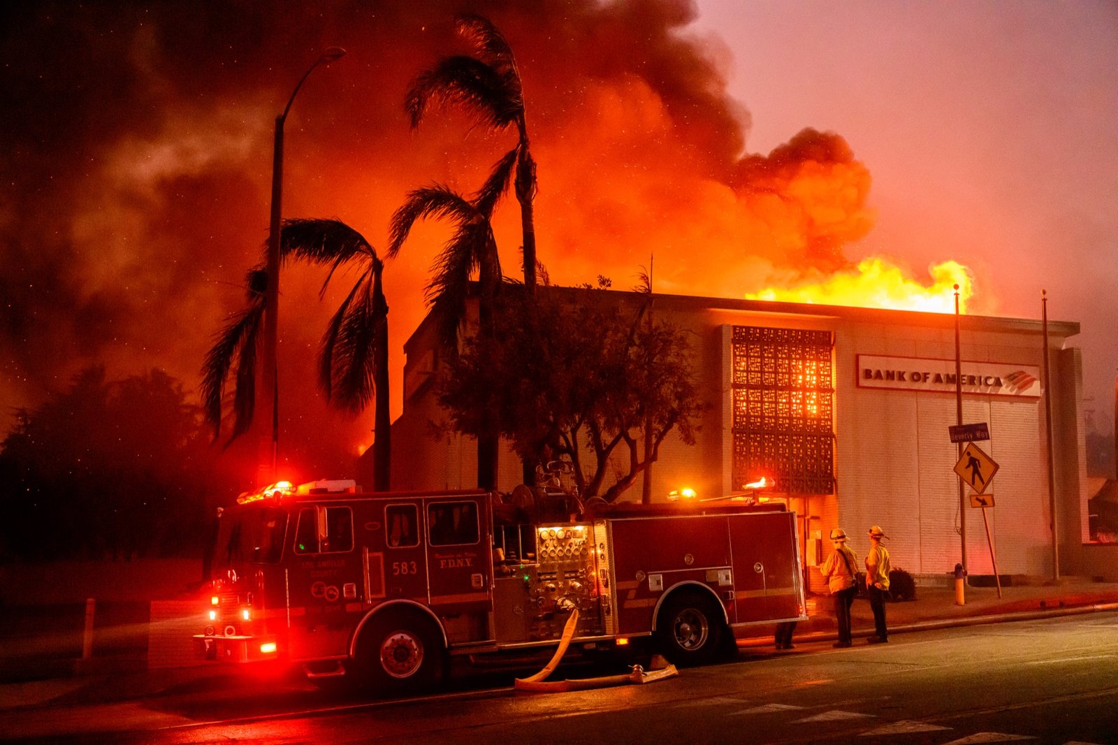 A Bank of America is fully engulfed in flames along Lake Ave during the Eaton fire in the Altadena area of Los Angeles county, California on January 08, 2025. (Josh Edelson / AFP)