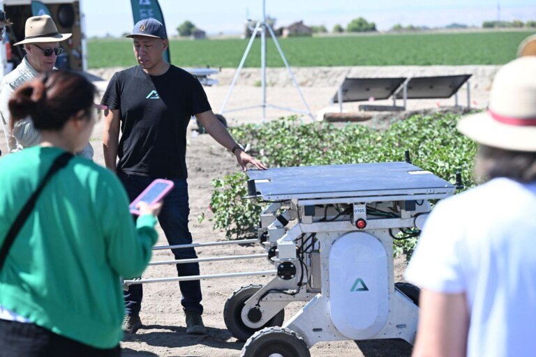 Aigen agricultural robot demonstrated in a Salinas Valley field, ag tech event photography by Josh Edelson