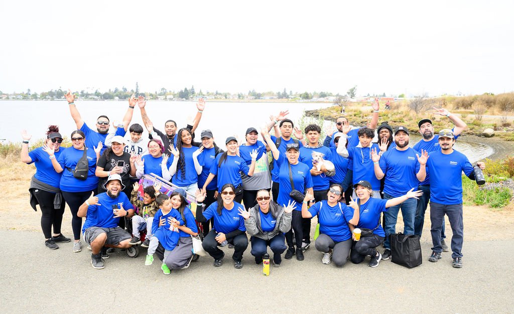 Matson employees volunteering on California Coastal Cleanup Day along the Oakland shoreline, corporate volunteer photography by Josh Edelson