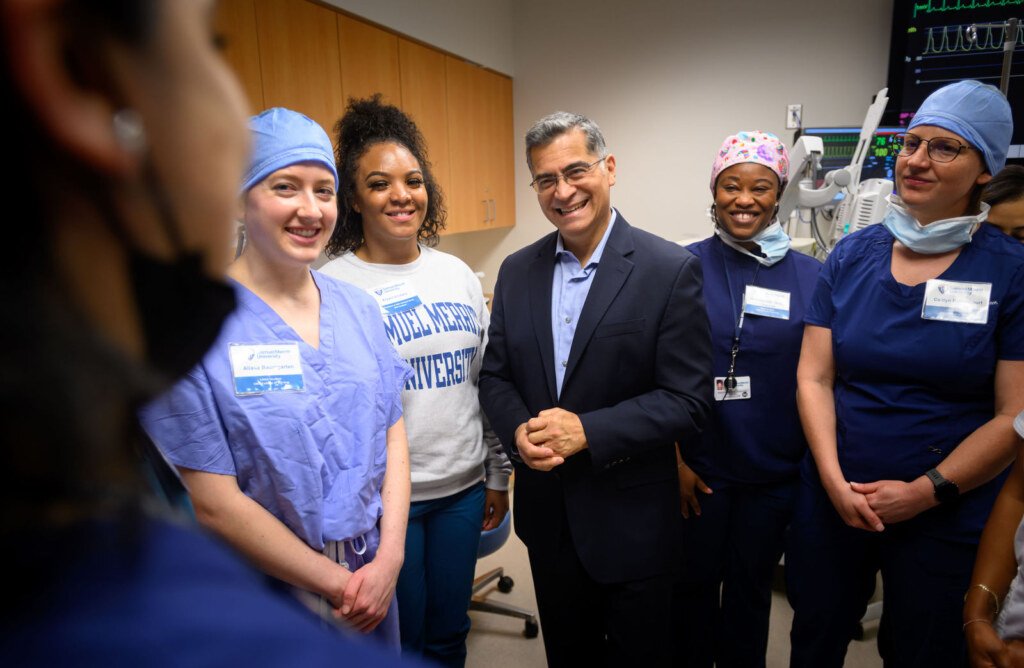 Xavier Becerra, then U.S. Secretary of Health and Human Services, visits the simulation center at Samuel Merritt University in Oakland, photographed by Josh Edelson